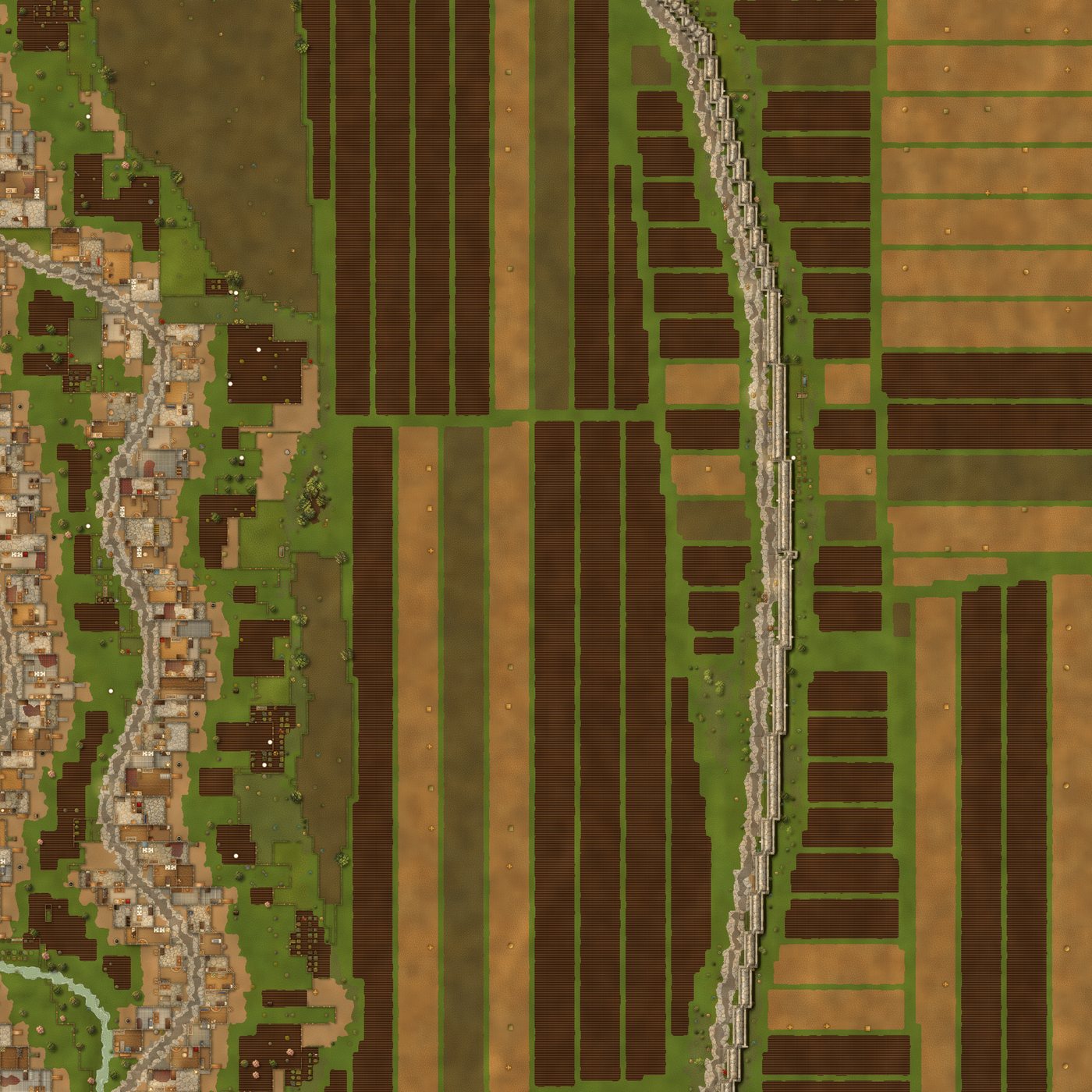 Edge of a town giving way to strip fields and a river